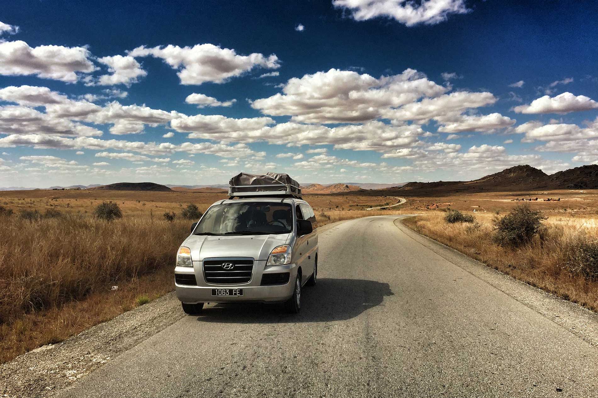 Nomstour vehicle on Madagascar highlands road
