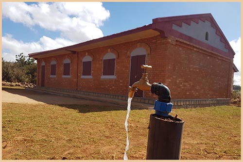 The new school building with running water faucet