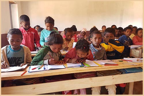 Children learning in the new classroom